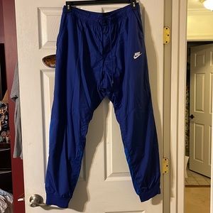 Mens XL Blue double-toned Nike track pants.
